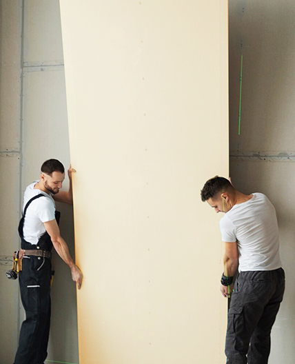 cement board manufacturing |Two men working together