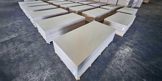 Cement board panels neatly stacked for shipping
