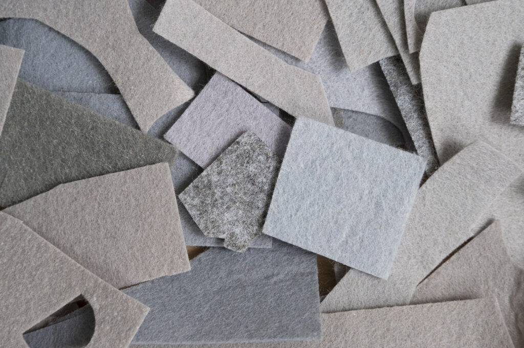 Engineered fiber cement boards stacked in a UAE factory warehouse